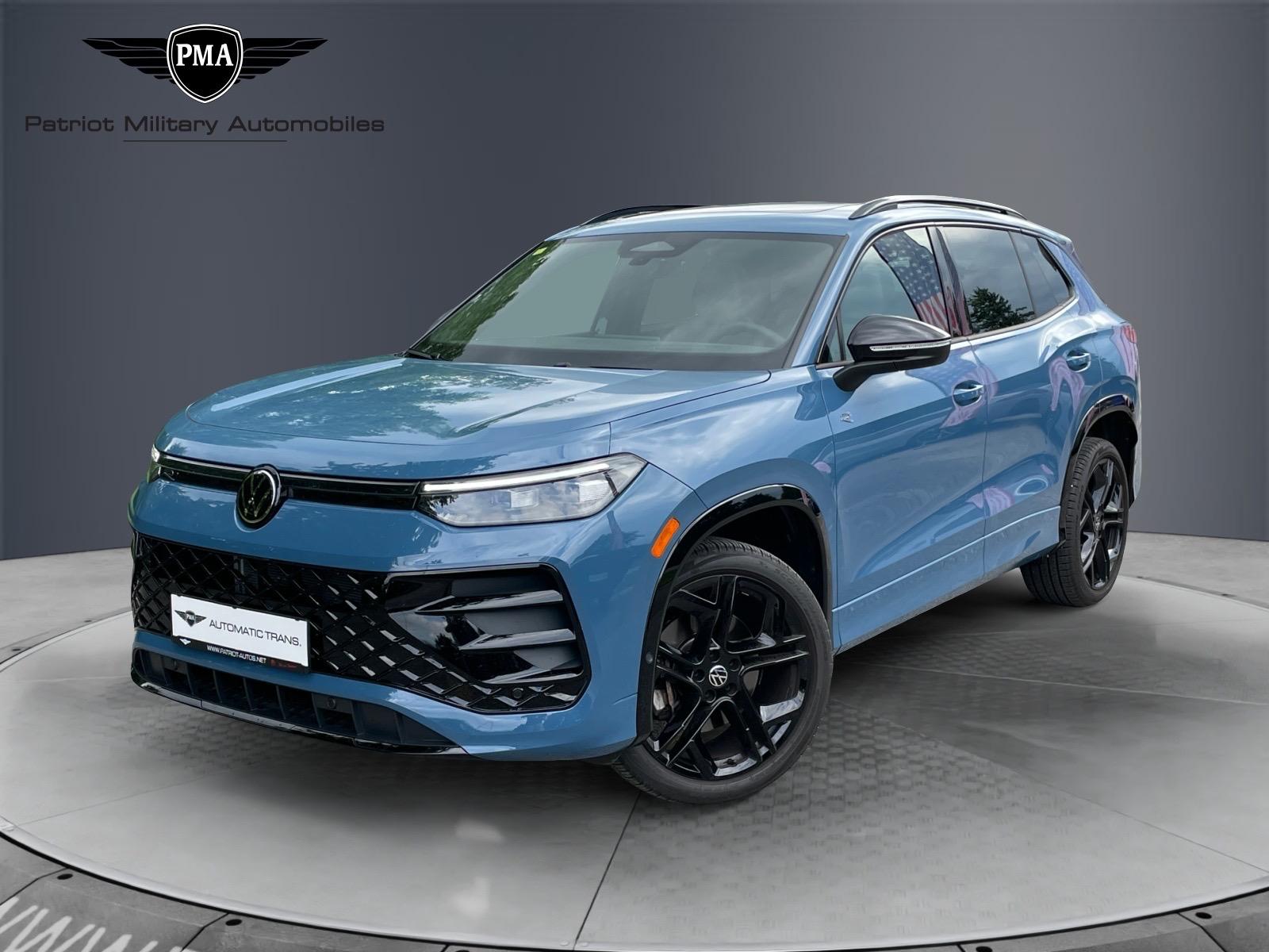 2025 VW Tiguan SE R-Line Black 4motion in Monterey Blue Pearl w/Deep Black Roof – photo 1 of 18